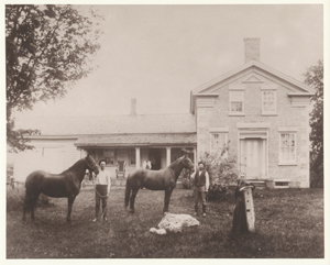 Oliver G. Secor and Sarah Taylor Secor on farm near Savannah, NY